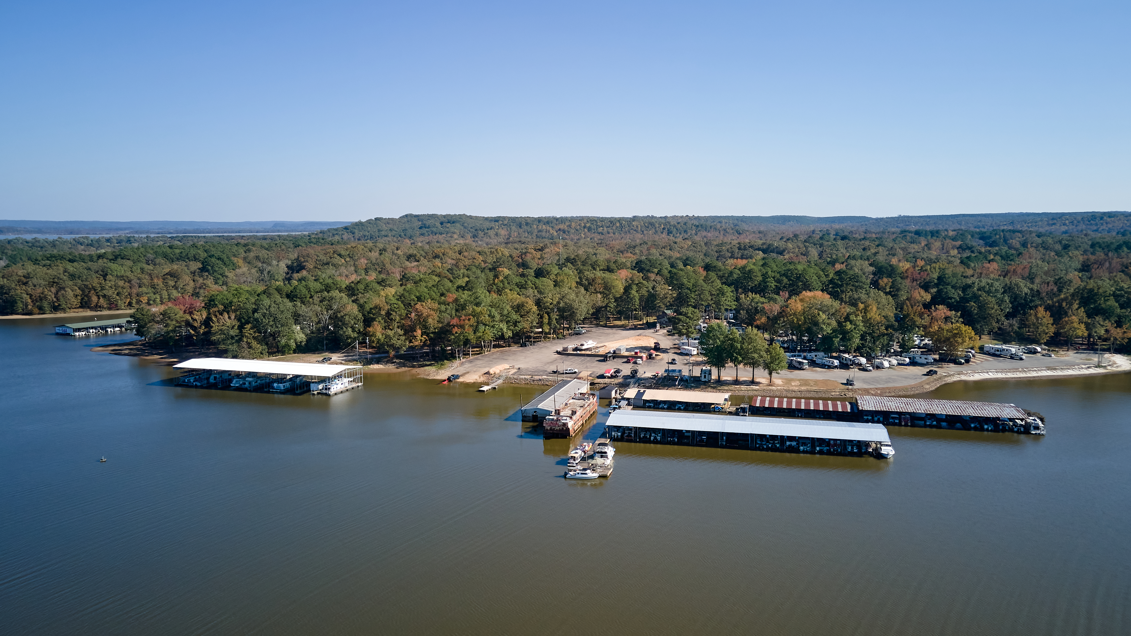 Image of marina with boats by shore.